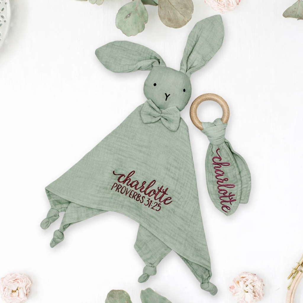 Green baby comfort blanket and teething ring 